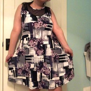 Sleeveless purple dress with abstract designs and sheer neck panels scoop neck